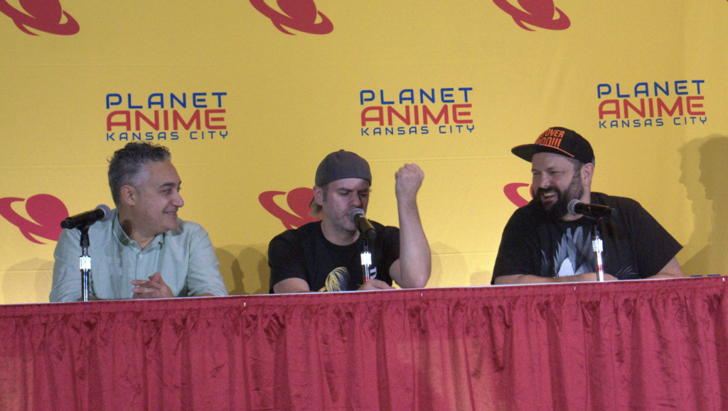 a panel of voice actors at planet anime.